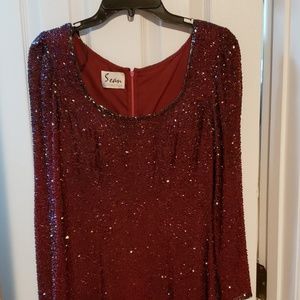 Stunning formal gown with 10.000 hand sewn beads.